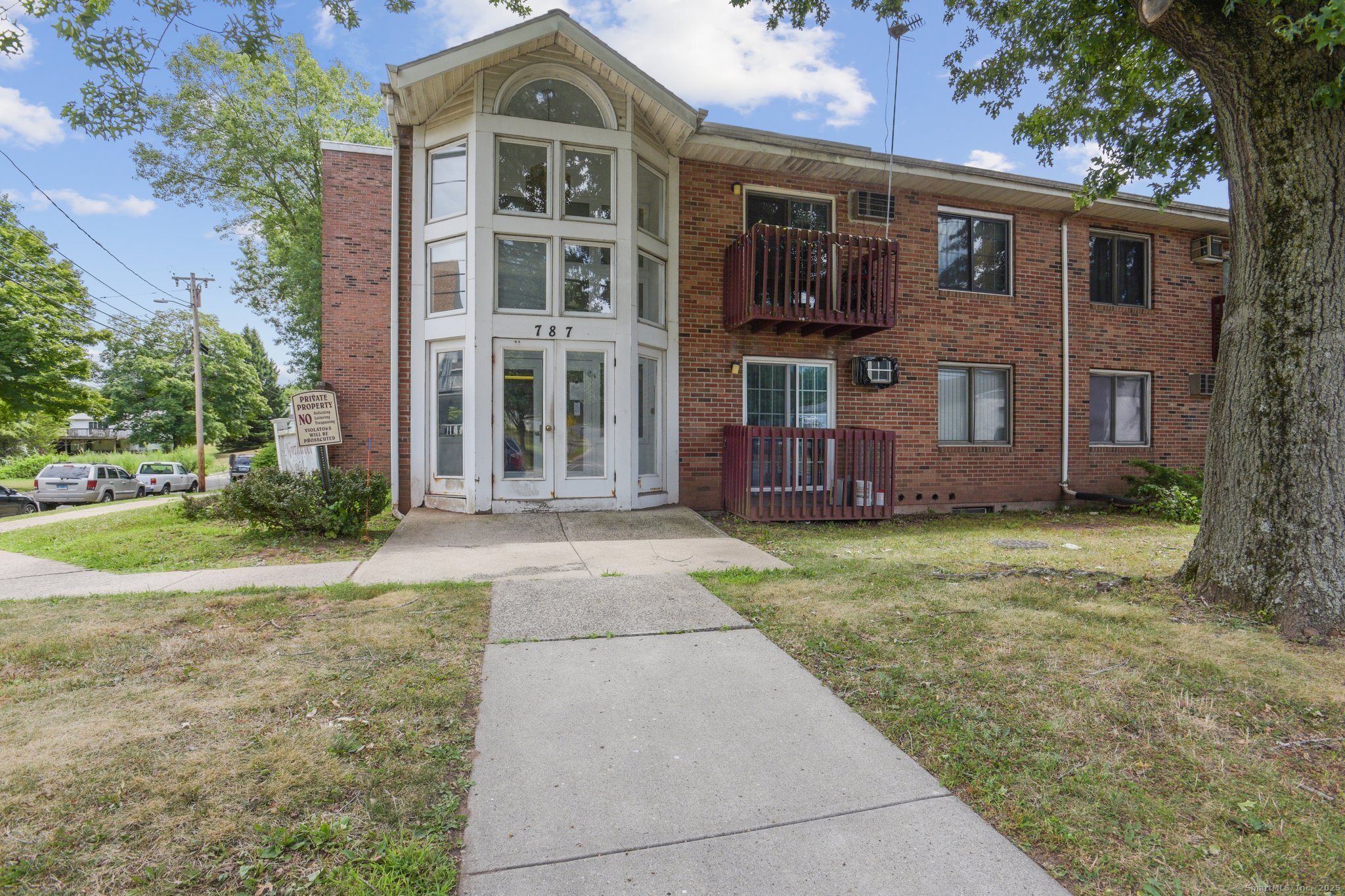 787 North Colony Road, Unit 12 Meriden, CT 06450 - Photo 1 of 1 a front view of a house with garden