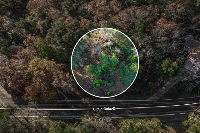 an aerial view of a highlighted house