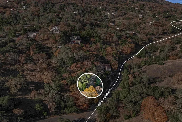 a backyard of a house with lots of green space