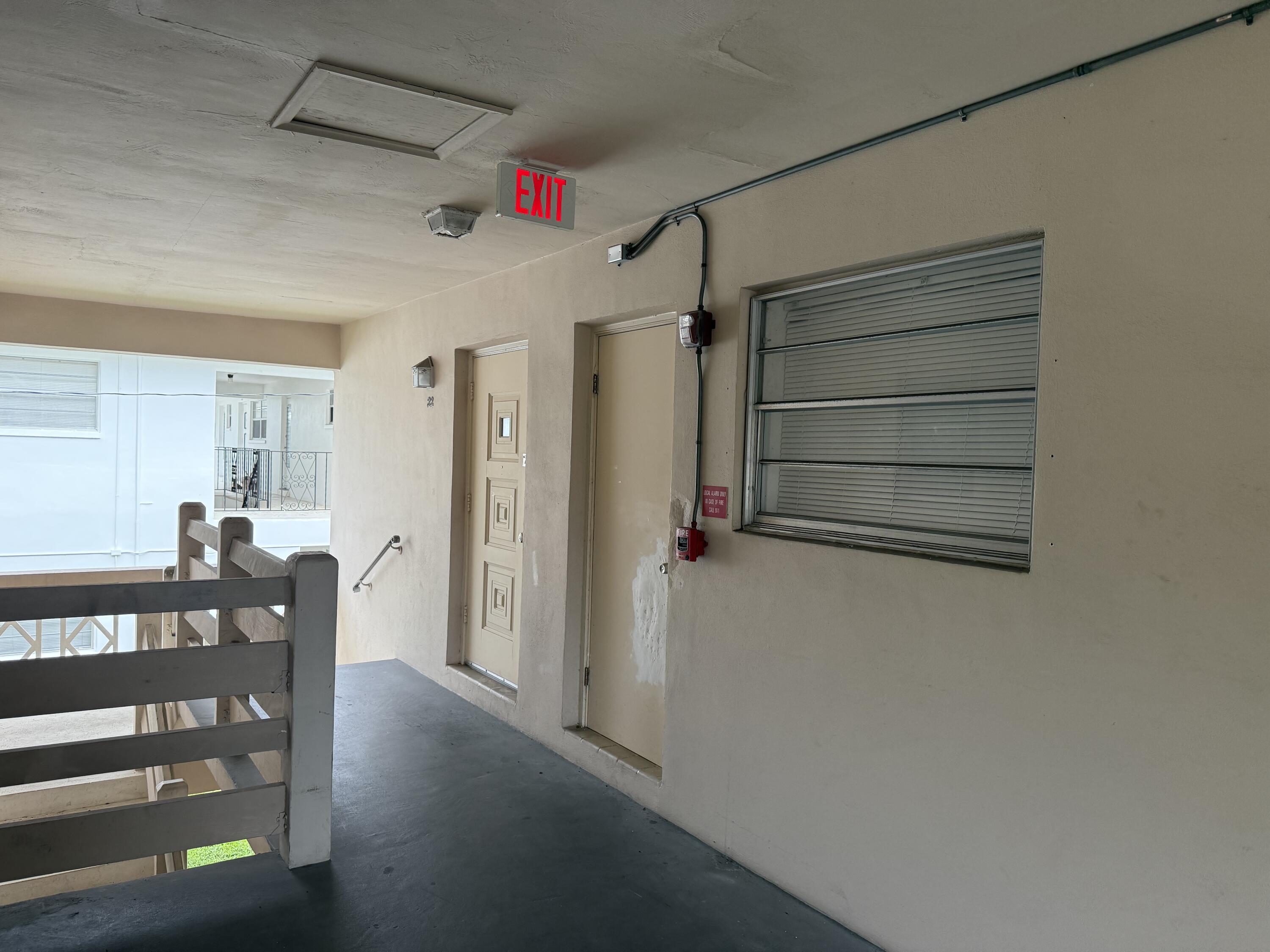 3600 Jackson Street, Unit 22 Hollywood, FL 33021 - Photo 8 of 8 a view of a livingroom with furniture and staircase