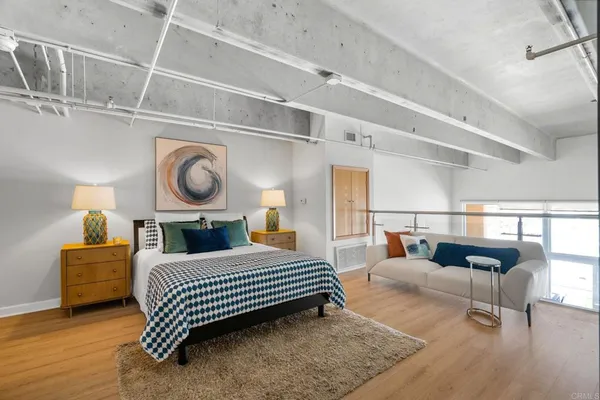 a bedroom with a bed and a walk in closet