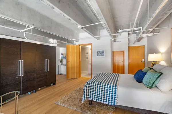 a bathroom with a sink a mirror and a shower