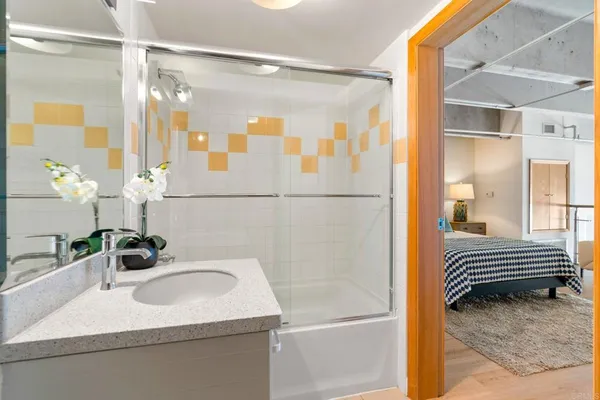 a bathroom with a sink and a mirror
