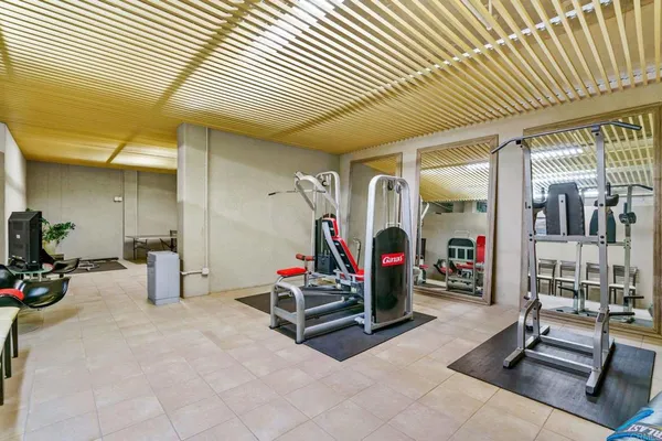 a room with musical instruments and air hockey table
