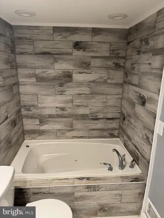 a bathroom with a bathtub