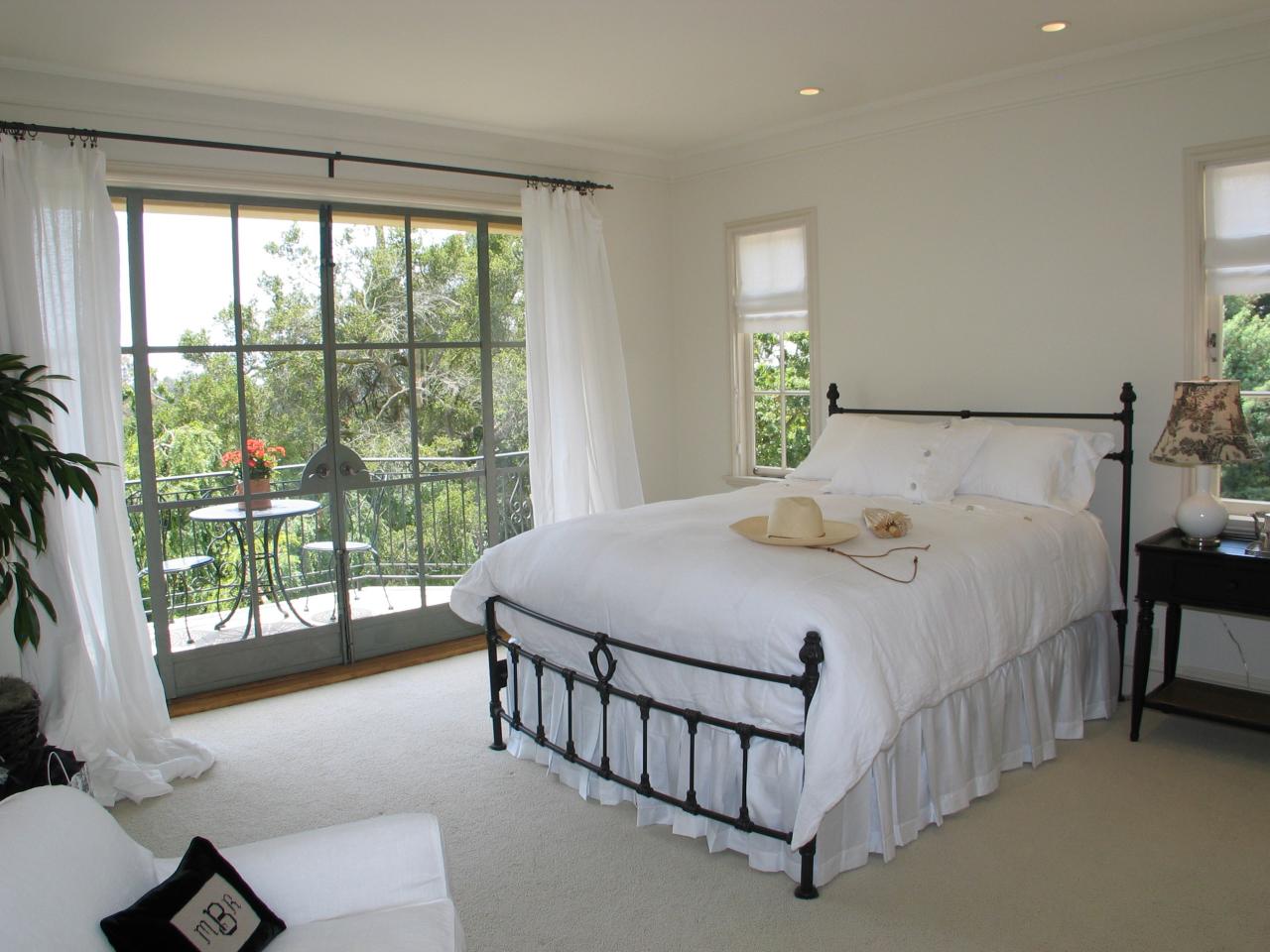 1129 High Road Santa Barbara, CA 93108 - Photo 13 of 18 a bedroom with a bed and a view of balcony