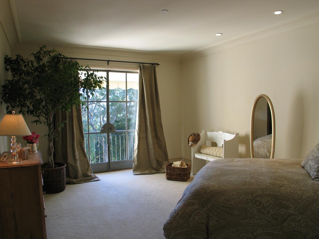 1129 High Road Santa Barbara, CA 93108 - Photo 14 of 18 a bedroom with bed and a large window