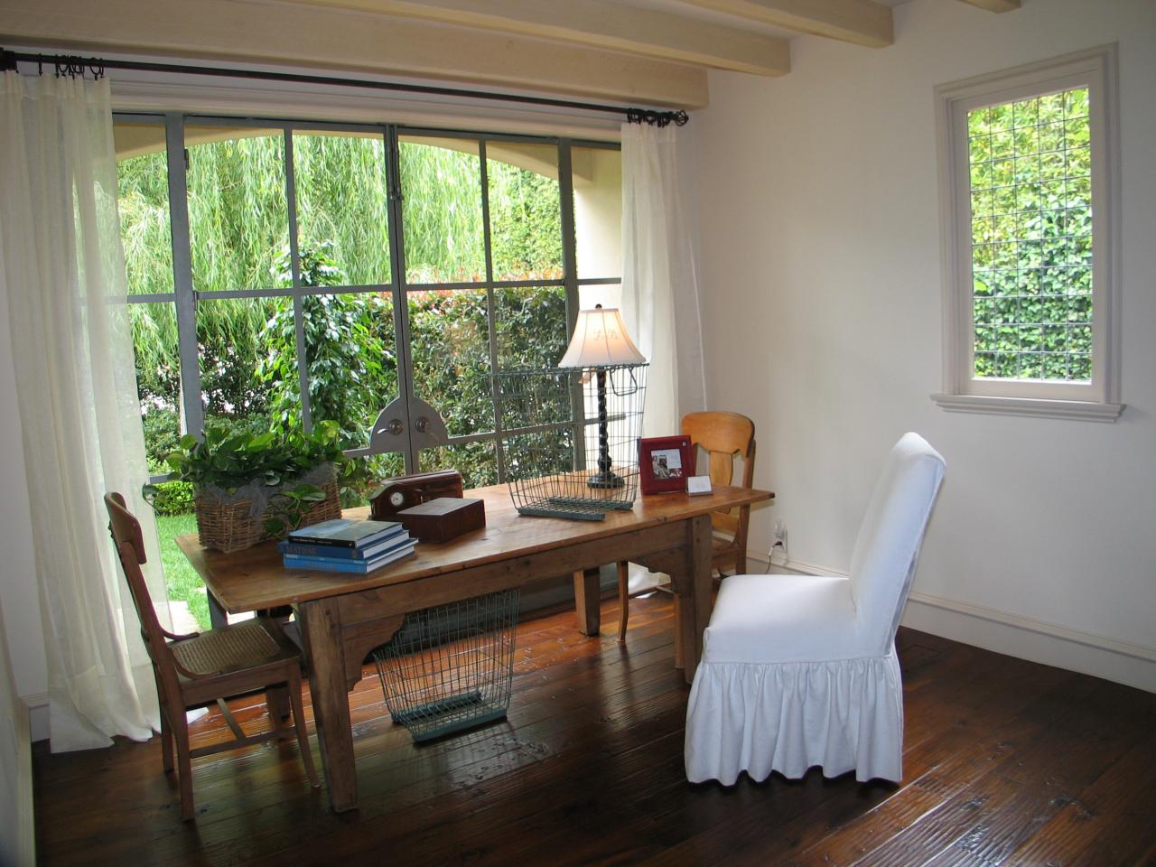 1129 High Road Santa Barbara, CA 93108 - Photo 15 of 18 a dining room with furniture and wooden floor