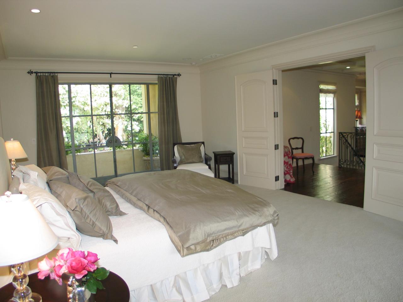 1129 High Road Santa Barbara, CA 93108 - Photo 9 of 18 a bedroom with a bed and a large window