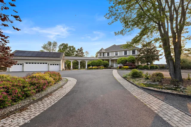 a large kitchen with a table and chairs