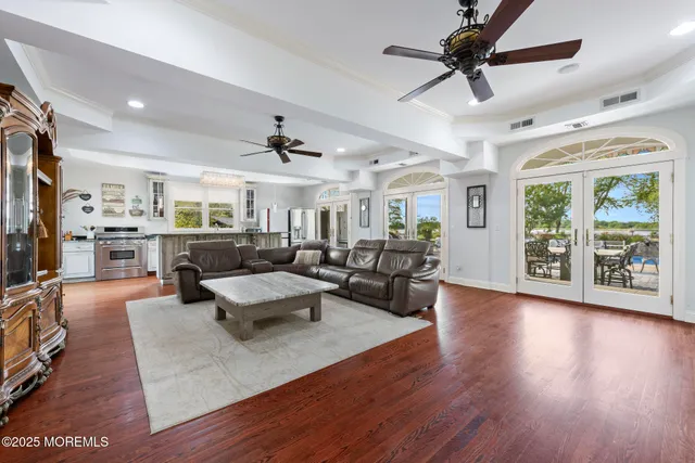 a en suite spacious bathroom with a tub sink and glass door
