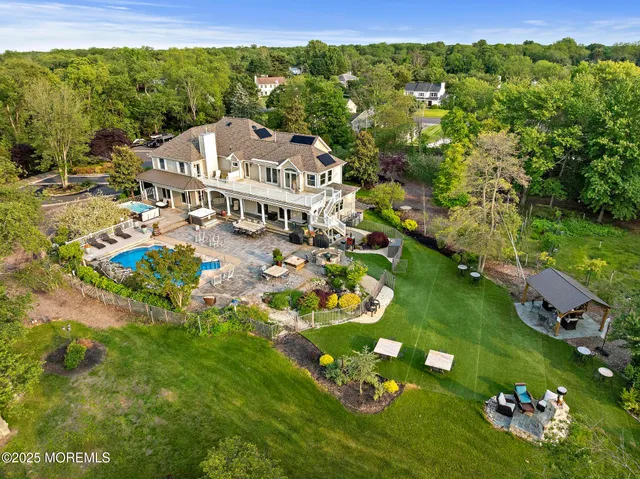 a view of a chairs and table in the patio