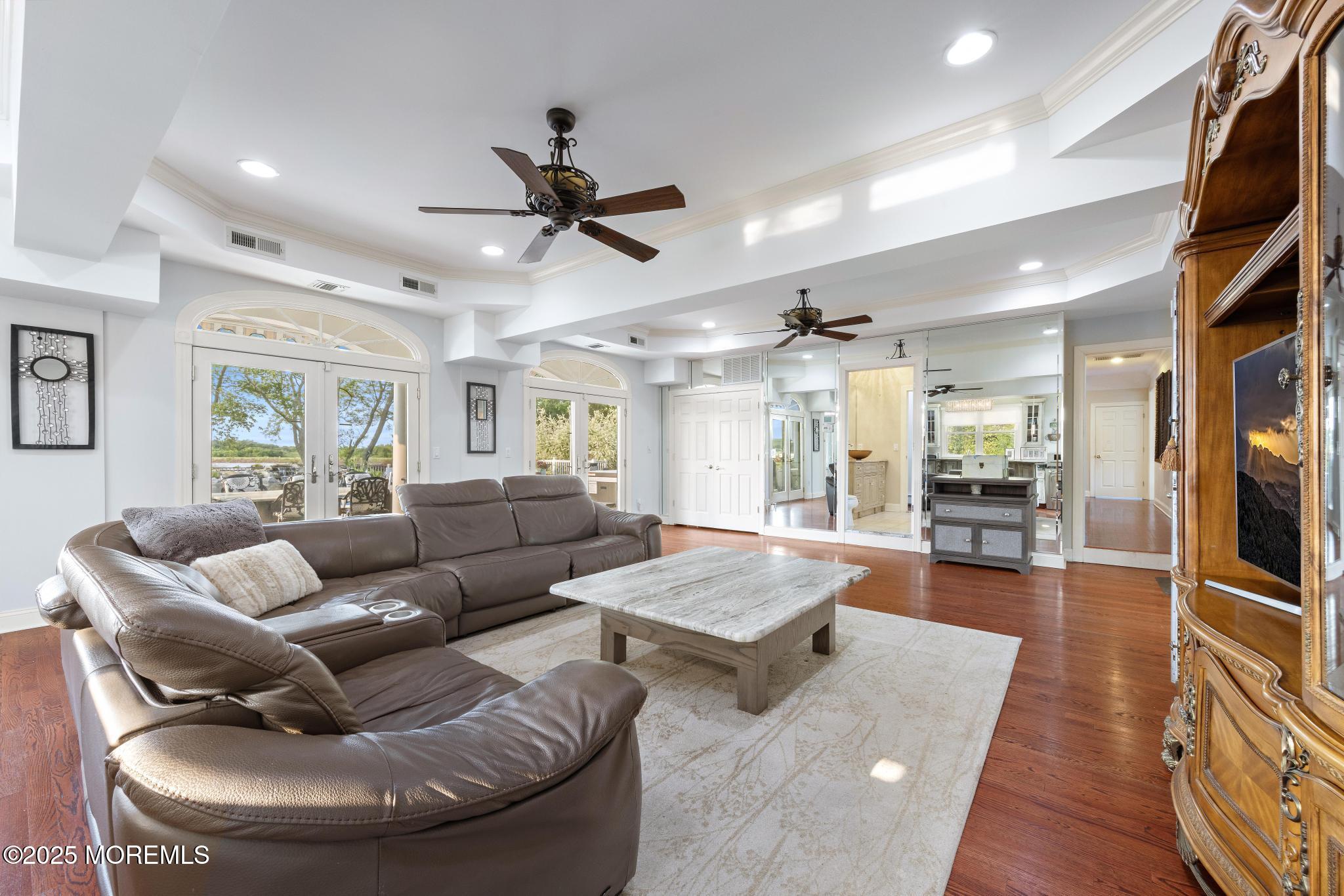 1413 Gully Road Wall, NJ 07719 - Photo 31 of 82 a living room with furniture and a wooden floor