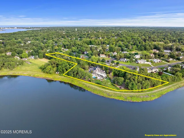 a view of a lake with a building in the background