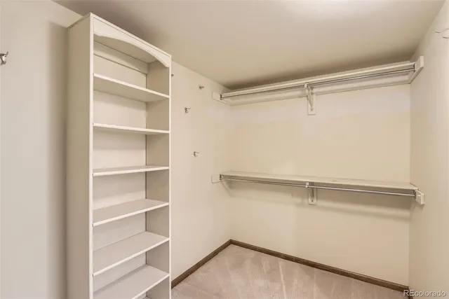 a view of an empty walk in closet