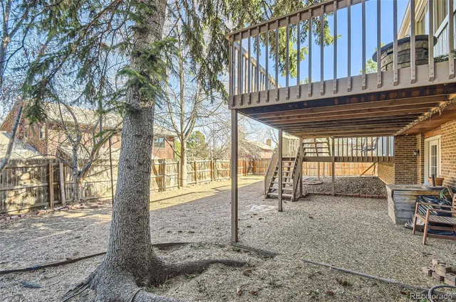 a view of a backyard with a patio