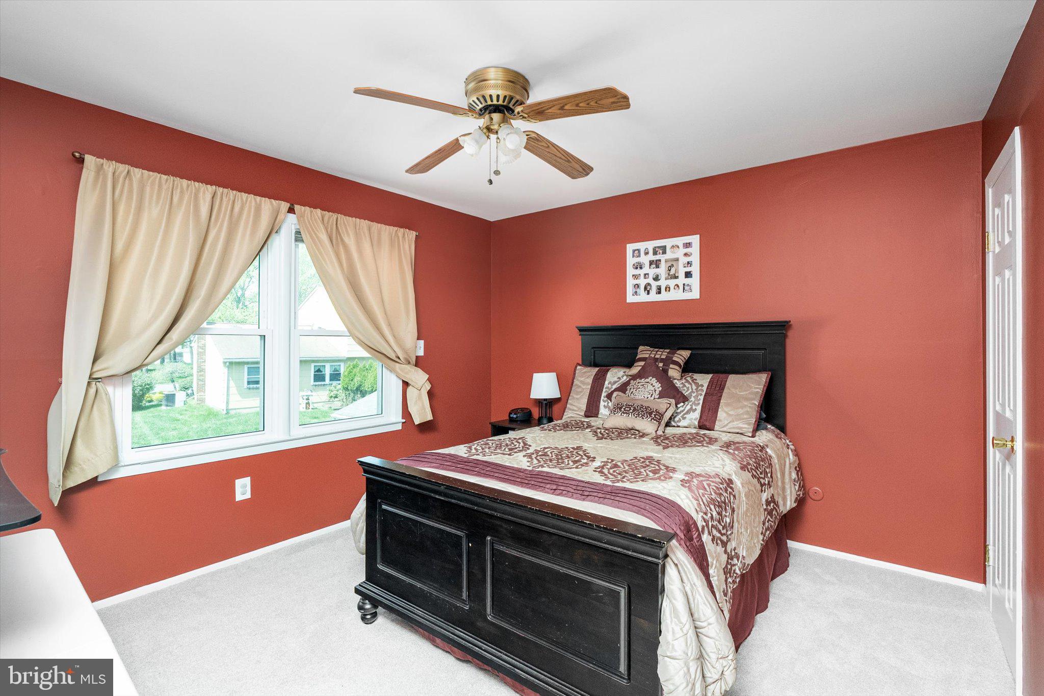 3 David Drive Ewing, NJ 08638 - Photo 16 of 32 a bed sitting in a bedroom next to a window