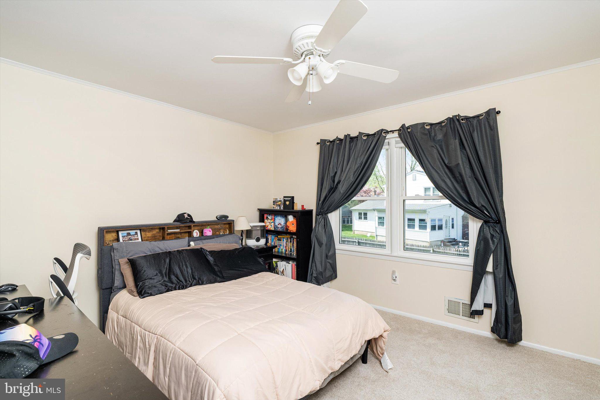 3 David Drive Ewing, NJ 08638 - Photo 17 of 32 a bedroom with a bed and a chandelier