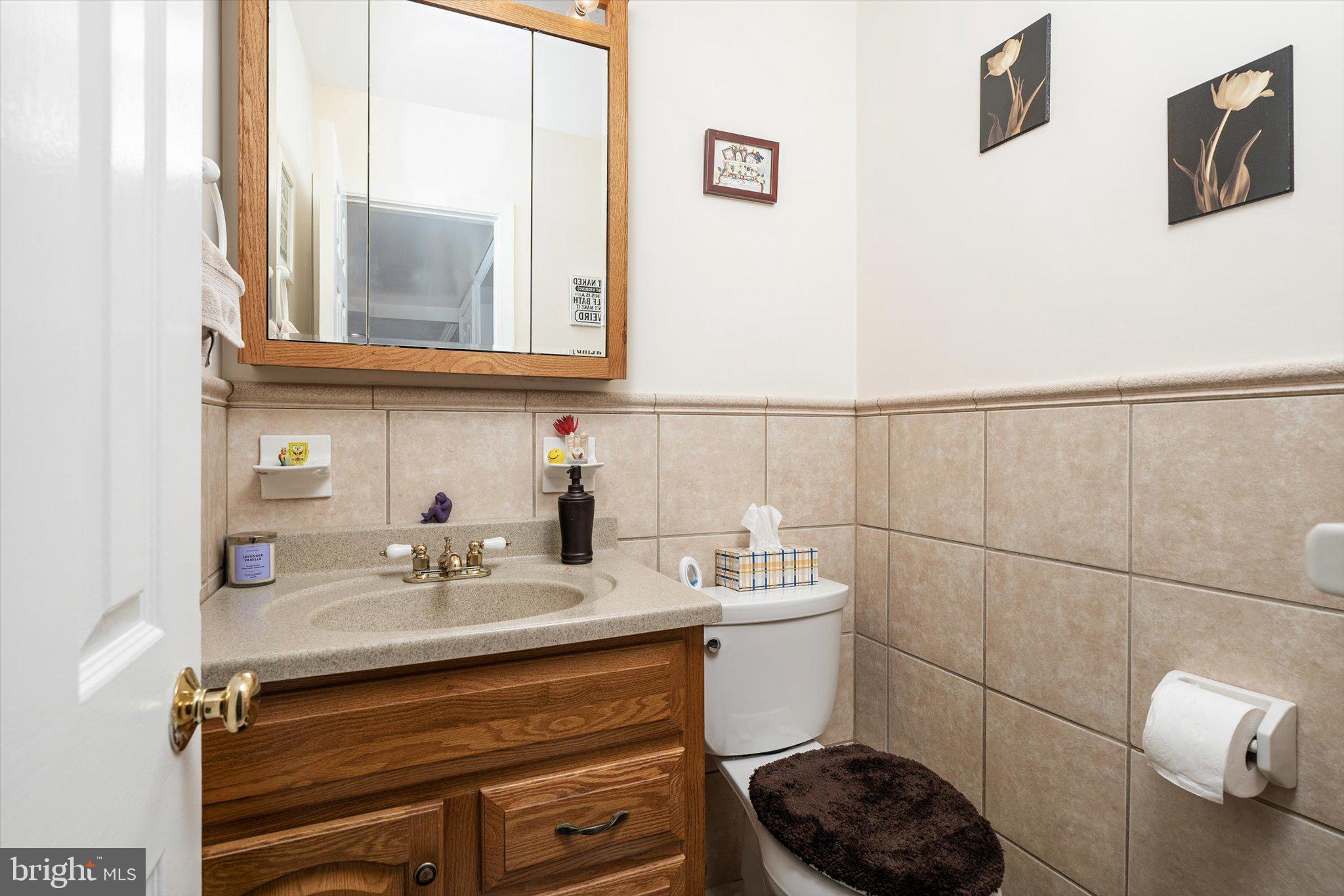 3 David Drive Ewing, NJ 08638 - Photo 18 of 32 a bathroom with a sink a toilet and mirror