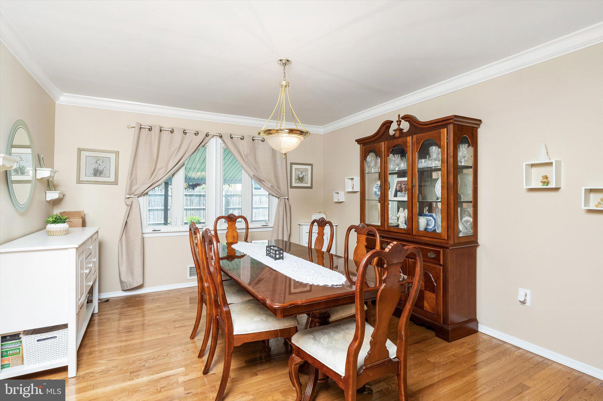 3 David Drive Ewing, NJ 08638 - Photo 6 of 32 a dining room with furniture a chandelier and wooden floor