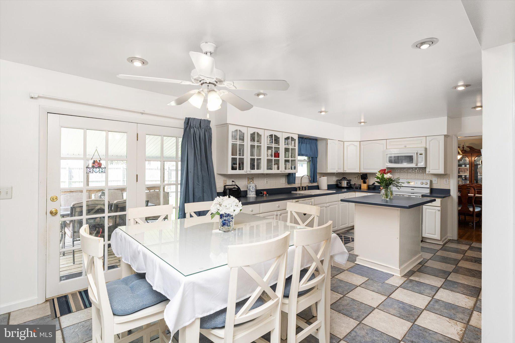 3 David Drive Ewing, NJ 08638 - Photo 7 of 32 a kitchen with stainless steel appliances kitchen island granite countertop a sink and cabinets