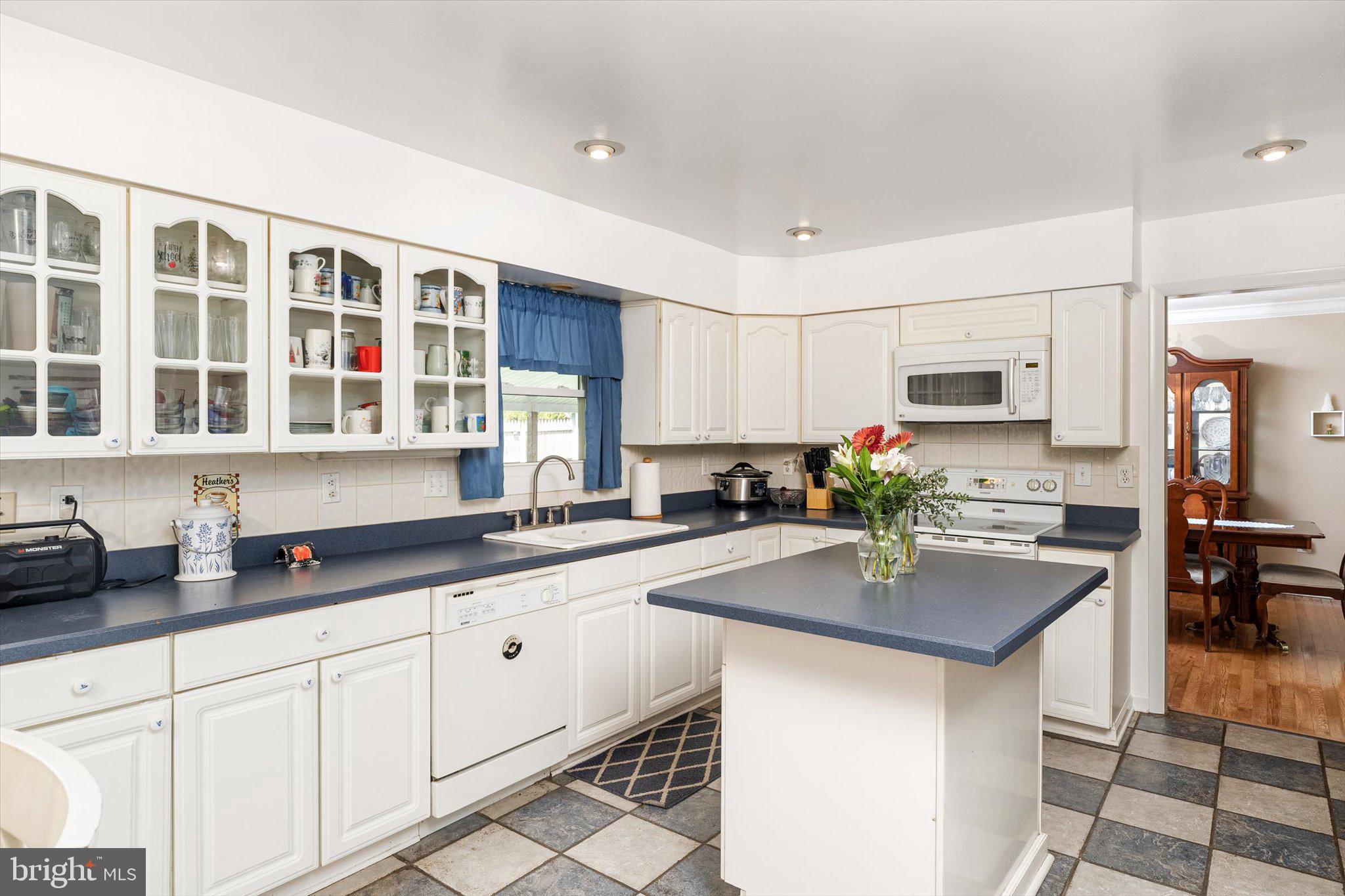 3 David Drive Ewing, NJ 08638 - Photo 8 of 32 a kitchen with stainless steel appliances granite countertop a sink and cabinets