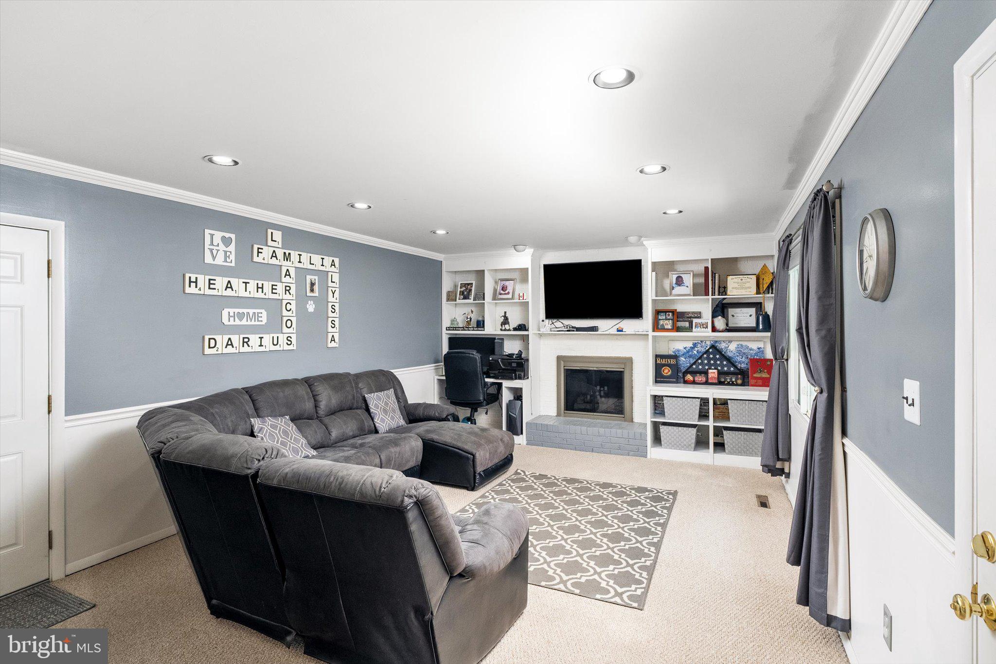 3 David Drive Ewing, NJ 08638 - Photo 10 of 32 a living room with furniture and a flat screen tv