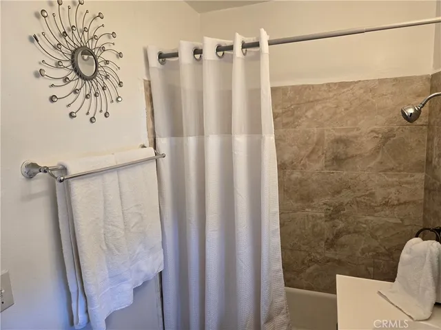 a view of livingroom with furniture and window