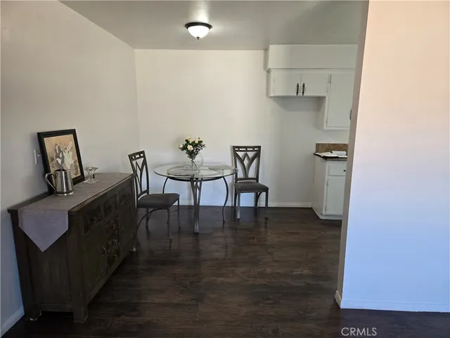a spacious bathroom with double vanity and a mirror