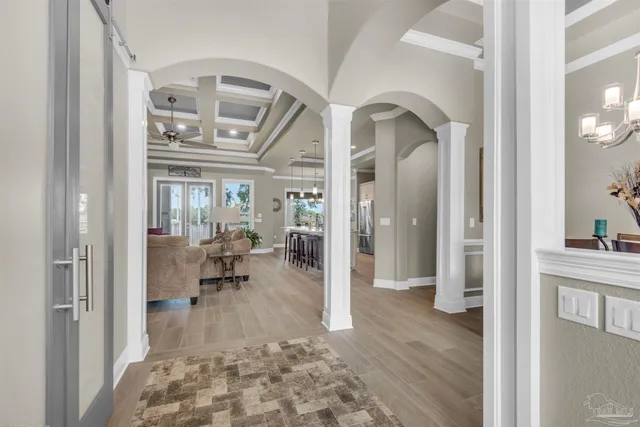 a kitchen with counter space dining table and chairs