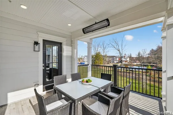 a view of a balcony dining area