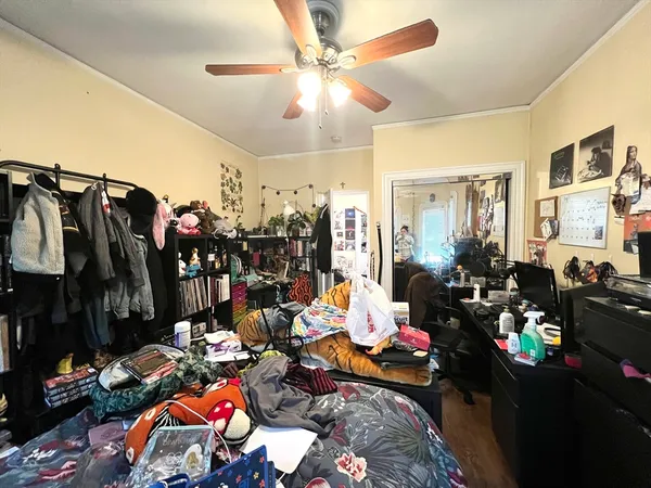 a group of people sitting in a living room