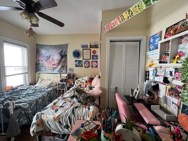 a bedroom with furniture and a bed