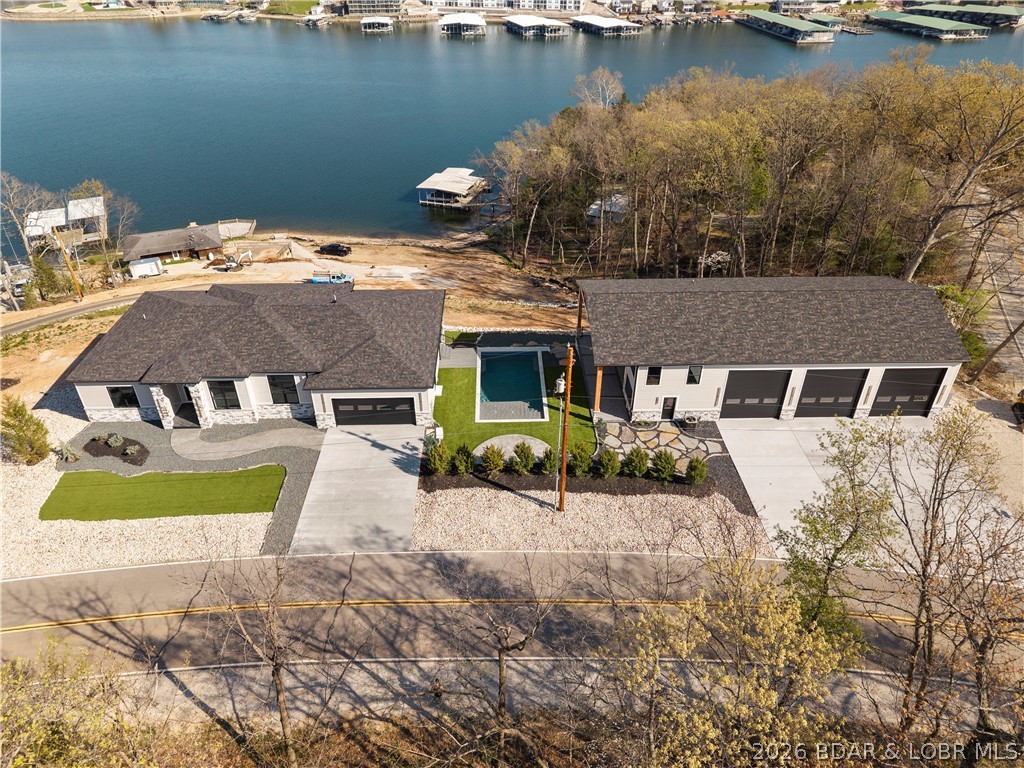 1356 Duckhead Road Lake Ozark, MO 65049 - Photo 2 of 99 Overhead view of shot of primary home, pool, and s