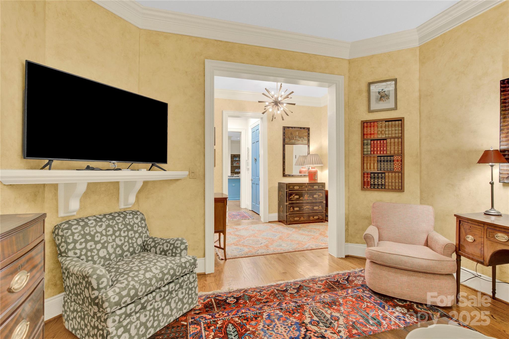 164 Cherokee Road Charlotte, NC 28207 - Photo 15 of 32 a living room with furniture and a flat screen tv