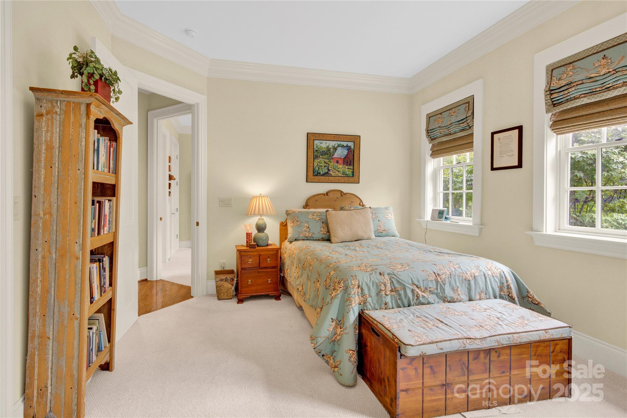164 Cherokee Road Charlotte, NC 28207 - Photo 24 of 32 a bedroom with a bed and a window