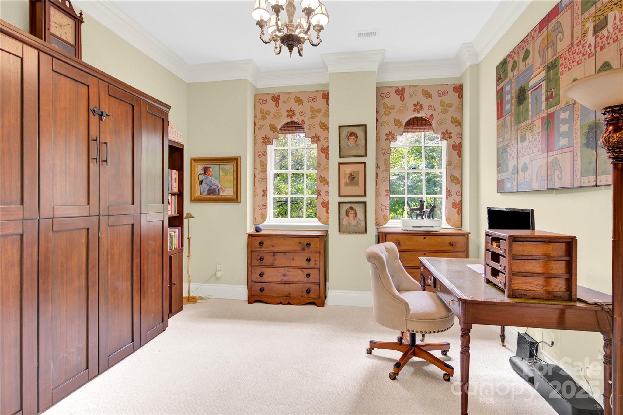 164 Cherokee Road Charlotte, NC 28207 - Photo 26 of 32 a workspace with chandelier