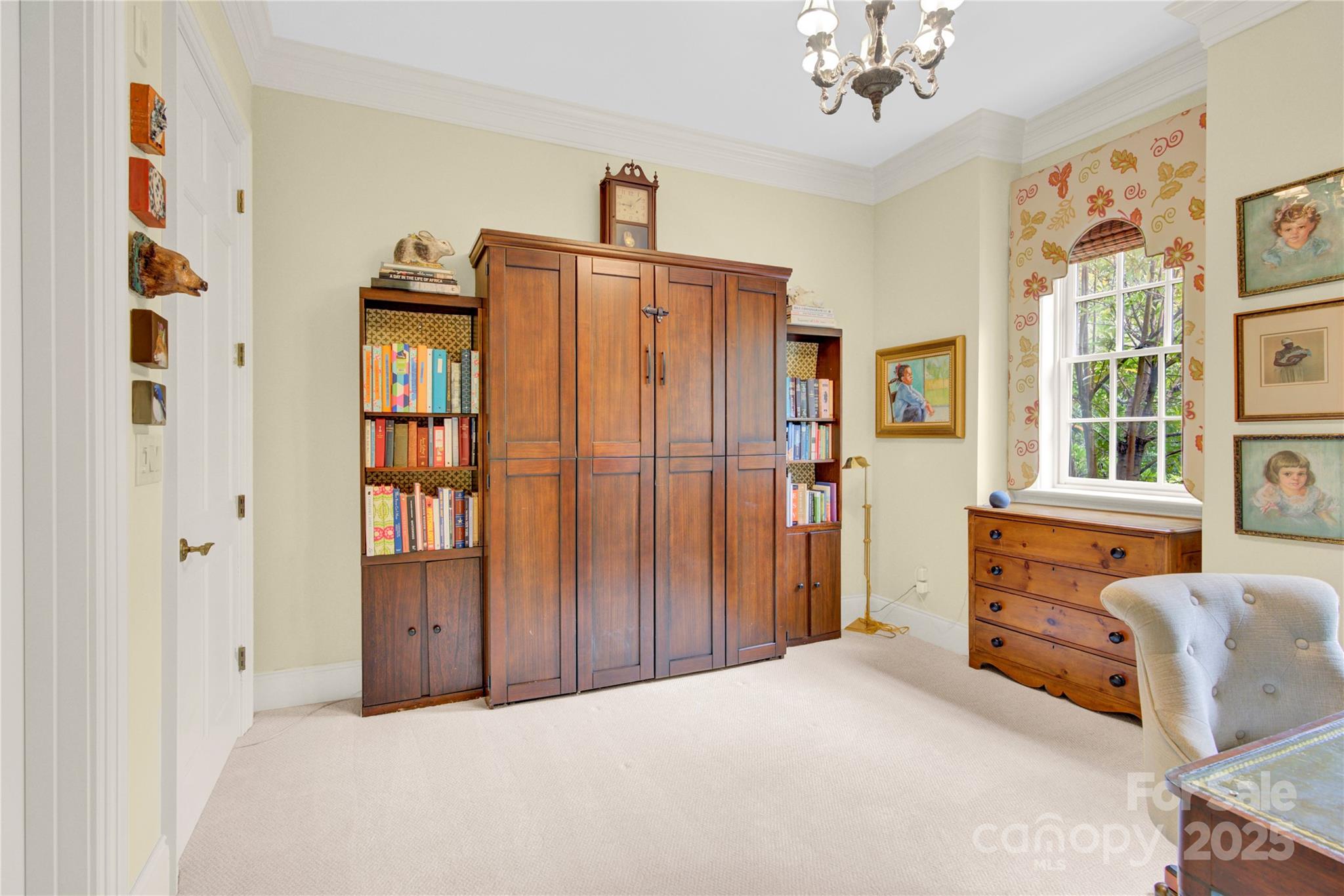 164 Cherokee Road Charlotte, NC 28207 - Photo 27 of 32 a bedroom with furniture and window