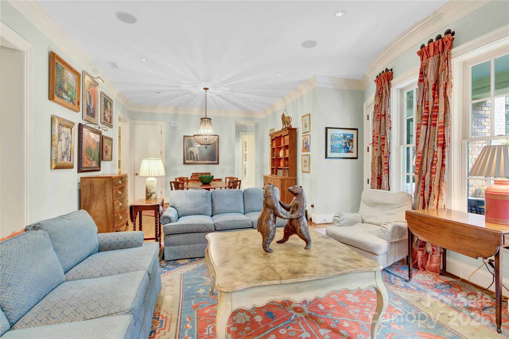 164 Cherokee Road Charlotte, NC 28207 - Photo 3 of 32 a living room with furniture and a flat screen tv