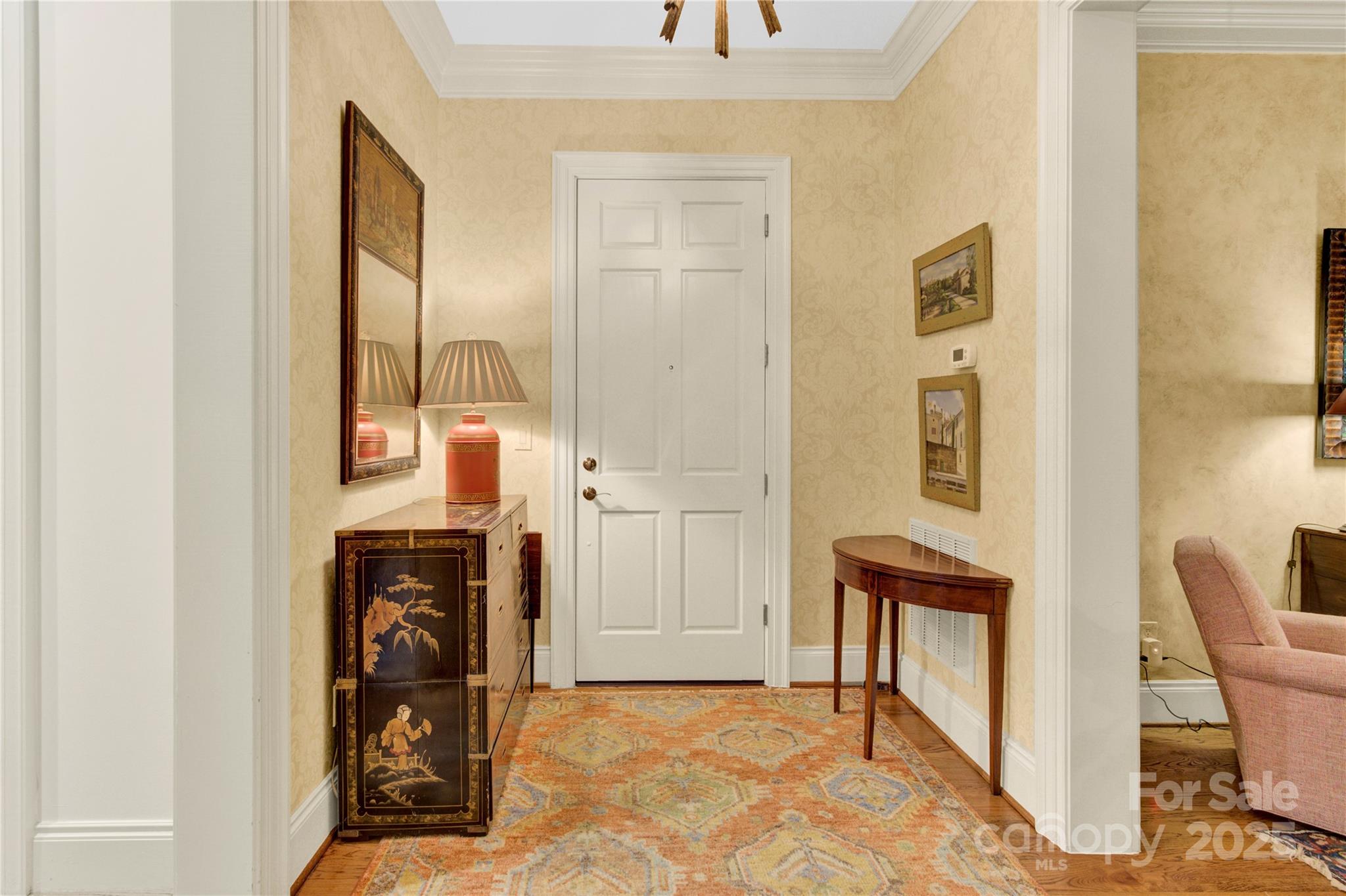 164 Cherokee Road Charlotte, NC 28207 - Photo 31 of 32 a view of a hallway with washer and dryer