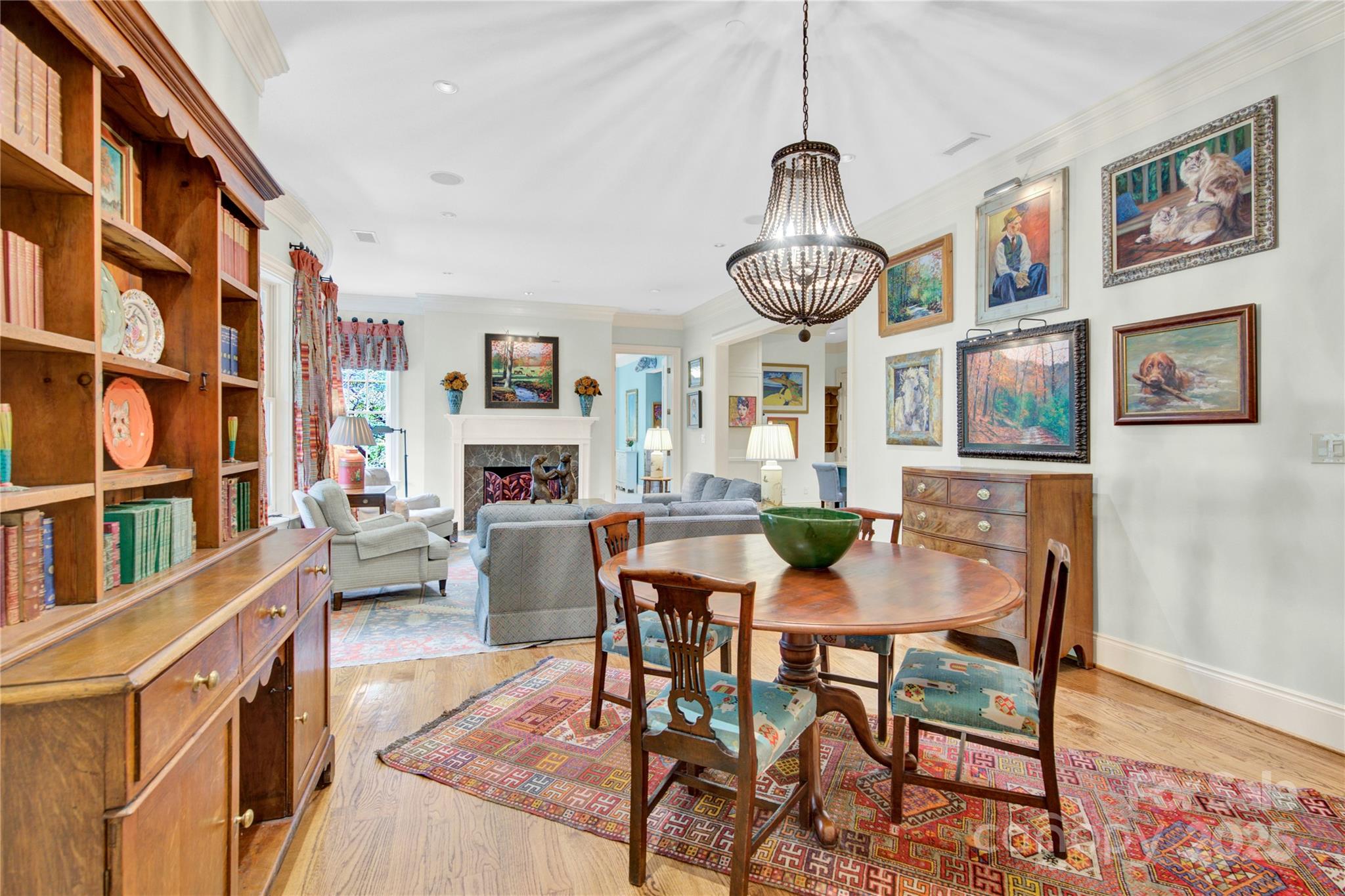 164 Cherokee Road Charlotte, NC 28207 - Photo 7 of 32 a view of a dining room with furniture window and wooden floor