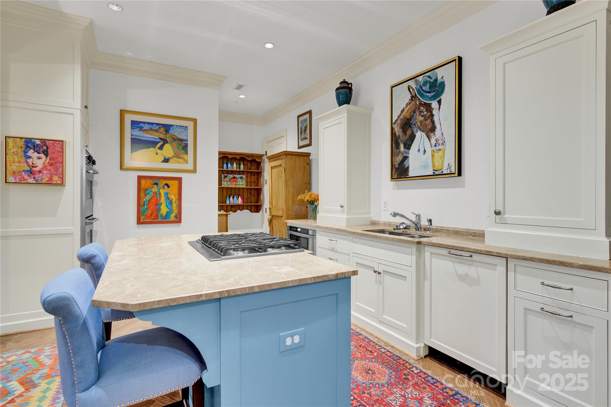 164 Cherokee Road Charlotte, NC 28207 - Photo 9 of 32 a kitchen with a sink cabinets and wooden floor