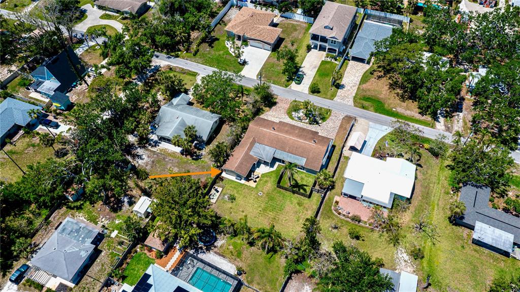 411 Pameto Road Nokomis, FL 34275 - Photo 75 of 85 an aerial view of multiple houses with yard