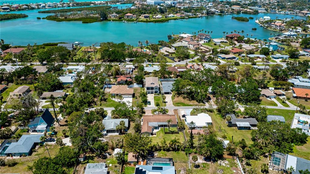 411 Pameto Road Nokomis, FL 34275 - Photo 85 of 85 an aerial view of city and lake