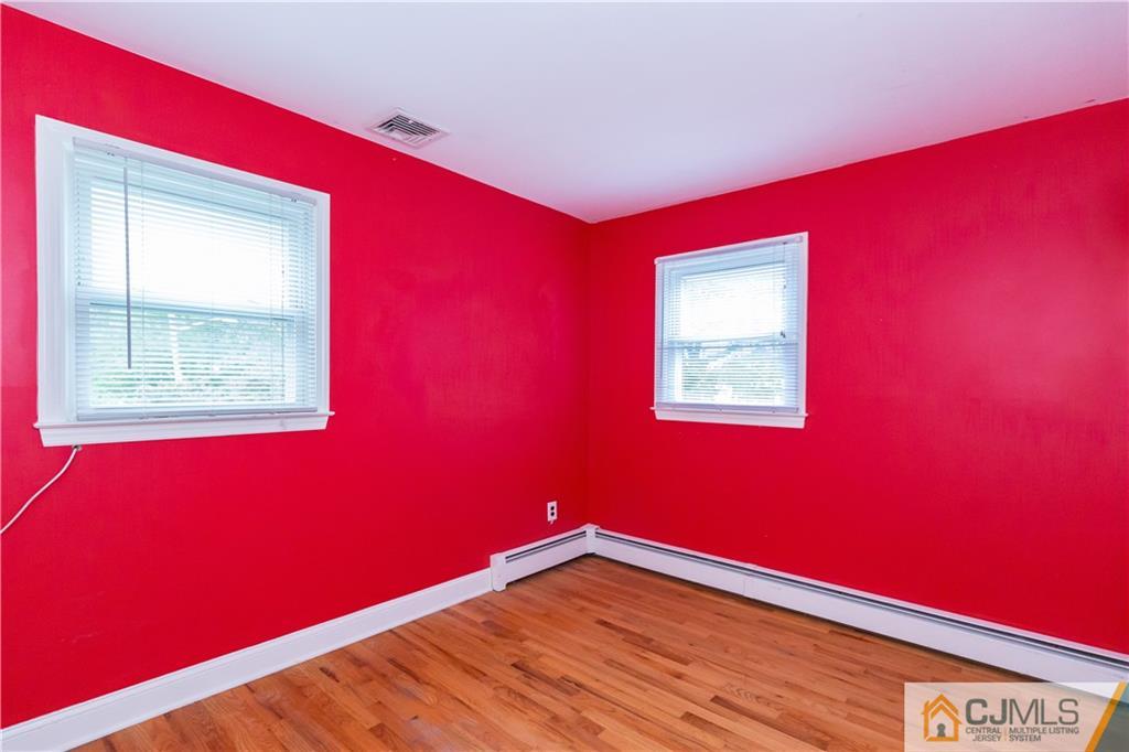 169 Old Post Road Edison, NJ 08817 - Photo 19 of 36 a view of empty room with window