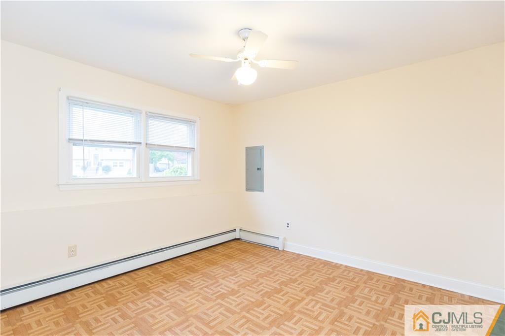 169 Old Post Road Edison, NJ 08817 - Photo 24 of 36 an empty room with a window