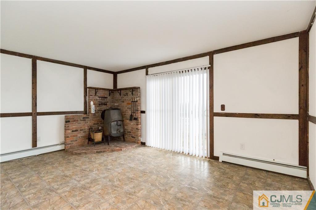 169 Old Post Road Edison, NJ 08817 - Photo 28 of 36 an empty room with windows