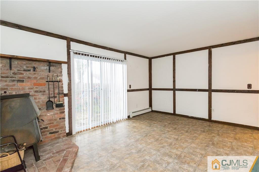 169 Old Post Road Edison, NJ 08817 - Photo 29 of 36 a view of an empty room with a window