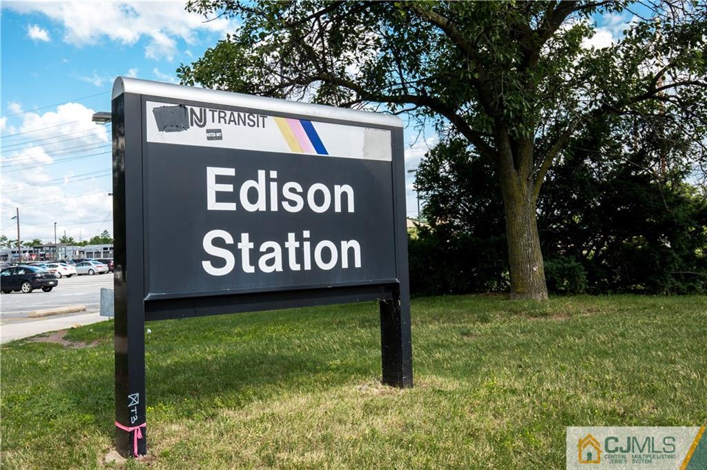 169 Old Post Road Edison, NJ 08817 - Photo 33 of 36 a sign broad in front of the red tree