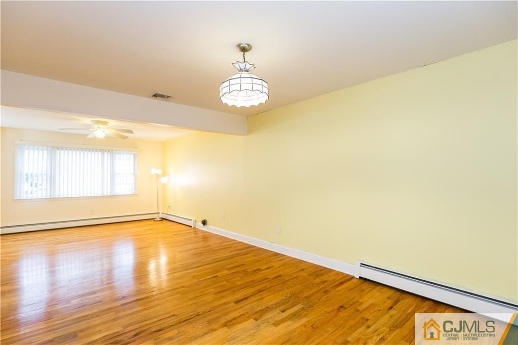 169 Old Post Road Edison, NJ 08817 - Photo 9 of 36 a view of an empty room with a window